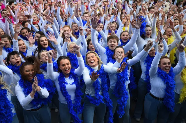 Dancers in Waterloo, London, cheer after breaking the Guinness World Record for the largest disco dance on November 25, 2018. (Photo by Kirsty O’Connor/PA Wire)