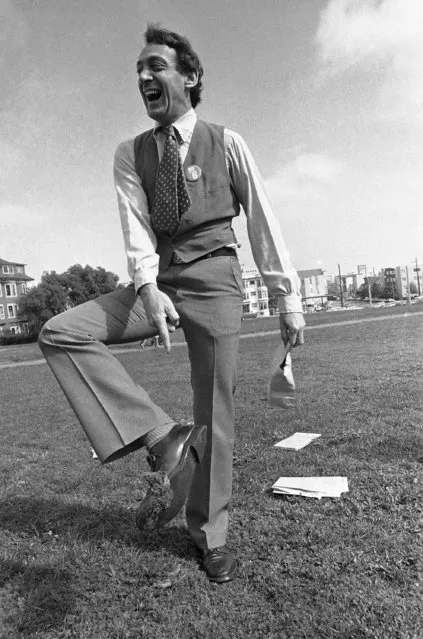 Supervisor Harvey Milk called the press together in San Francisco on October 20, 1978 to demonstrate (using artificial dog droppings) how pet owners could obey the city's new anti-litter law, left, by scooping up the dropping. All went well until Supervisor Milk found he had accidentally stepped into some real dog dropping. (Photo by James Palmer/AP Photo)