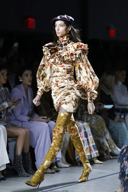 Fashion from the Zimmermann Fall 2019 show is modeled during Fashion Week, Monday, February 11, 2019 in New York. (Photo by Mark Lennihan/AP Photo)