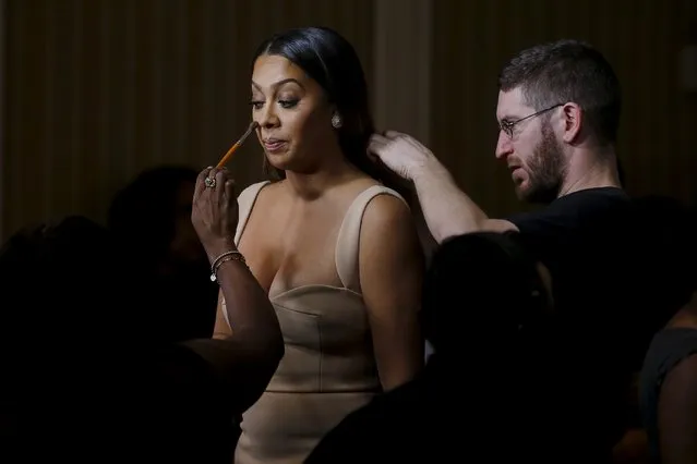 Television personality La La Anthony has her makeup touched up and an earpiece installed after she arrived for the Essence Black Women in Hollywood luncheon in Beverly Hills, February 25, 2016. (Photo by Carlo Allegri/Reuters)