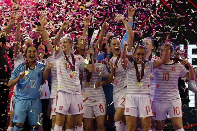 Spain national team players celebrate with the trophy after winning their UEFA Women's Futsal Euro Final match against Portugal, held at Multiusos de Gondomar Pavillion in Gondomar, Porto, northern Portugal, 17 February 2019. (Photo by Jose Coelho/EPA/EFE)