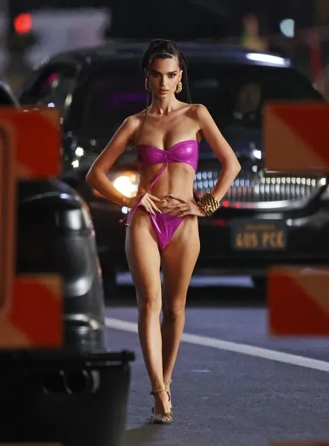 American model Emily Ratajkowski, 30, appeared in perfect shape from the front and back in a teeny hot pink bikini and high heels in Los Angeles on September 4, 2021. The beauty was in LA for a fashion show organised by singer Rihanna. (Photo by Backgrid USA)