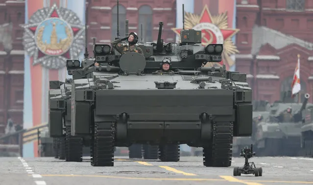 Russian servicemen drive Kurganets-25 Kurganets-25 armoured personnel carriers during the Victory Day parade, which marks the anniversary of the victory over Nazi Germany in World War Two, in Red Square in central Moscow, Russia on May 9, 2019. (Photo by Shamil Zhumatov/Reuters)