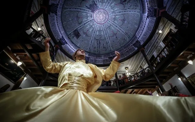 Whirling Dervishes perform on the Laylat al-Qadr, which commemorates the first revelation of the Holy Quran to Prophet Muhammad, at Culture Centre Of Karabas-i Veli, in Bursa, Turkey on May 31, 2019. (Photo by Sergen Sezgin/Anadolu Agency/Getty Images)