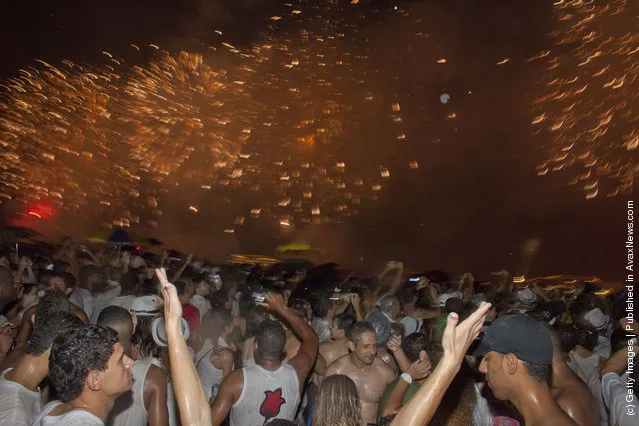 Brazilians Flock To Ocean For New Year's Eve Ritual