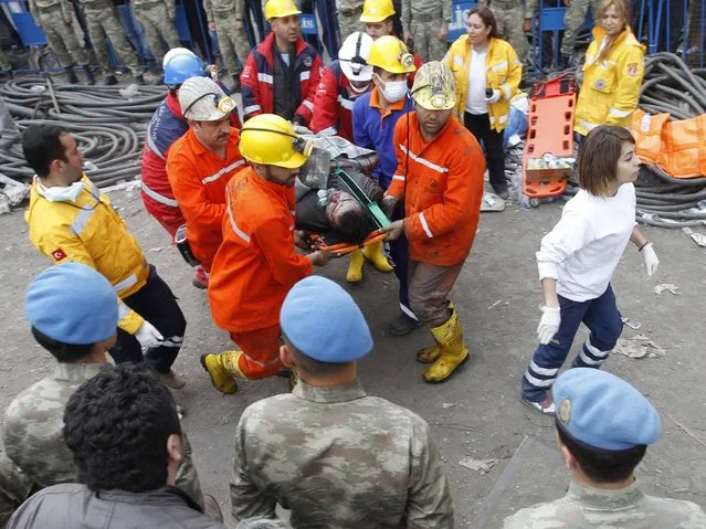 Rescuers pulled more dead and injured from the coal mine in western Turkey more than 12 hours after an explosion, bringing the death toll to 201 in the nation's worst mining disaster for decades. (Photo by Osman Orsal/Reuters)