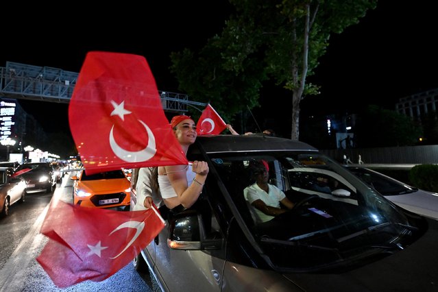 Turkish fans celebrate after their team qualified for last 16 stages following victory with car convoys in the UEFA EURO 2024 group stage match between Czechia and Turkiye on June 26, 2024 in Ankara, Turkiye. (Photo by Rasit Aydogan/Anadolu via Getty Images)