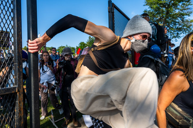 Protestors break through the barriers of the DNC in Park #578 during the March on the DNC 2024 in Chicago, IL on Monday, August 19, 2024. (Photo by Laura Thompson/Rex Features/Shutterstock)