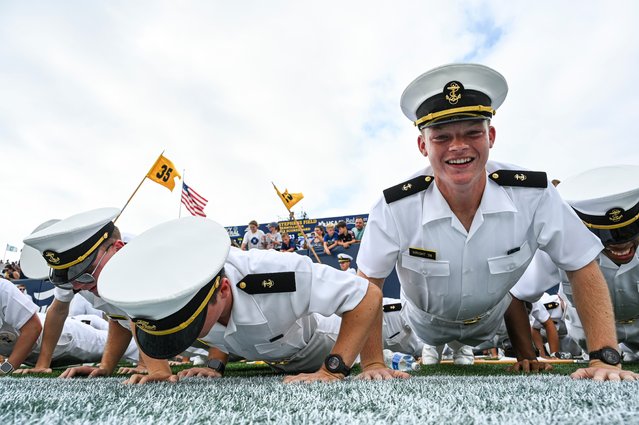 Navy Midshipmen do push ups after fourth quarter touchdown against the Bucknell Bison at Navy-Marine Corps Memorial Stadium in Annapolis, Maryland on August 31, 2024. (Photo by Tommy Gilligan/USA TODAY Sports)