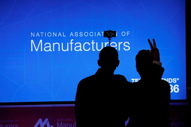 Speaker of the House Paul Ryan takes a selfie with National Association of Manufacturer's President Jay Timmons during their summit in Washington, U.S., June 20, 2017. (Photo by Aaron P. Bernstein/Reuters)