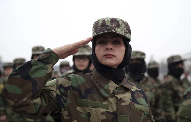 Newly graduated Afghan female National Army soldiers attend their graduation ceremony after a three month training program at the Afghan Military Academy in Kabul, Afghanistan, Sunday, January 5, 2020. (Photo by Rahmat Gul/AP Photo)