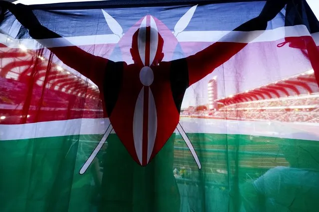 A fan of Kenya holds up a flag during the final in the women's 5000-meter run the World Athletics Championships on Saturday, July 23, 2022, in Eugene, Ore. (Photo by Gregory Bull/AP Photo)