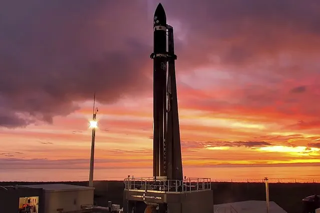 Rocket Lab's Electron rocket waits on the launch pad on the Mahia peninsula in New Zealand, Tuesday, June 28, 2022. NASA wants to experiment with a new orbit around the moon which it hopes to use in the coming years to once again land astronauts on the lunar surface. (Photo by Rocket Lab via AP Photo)