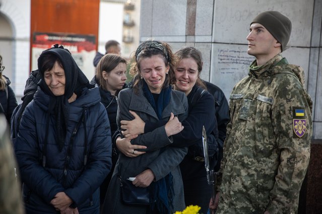 Relatives and friends say goodbye to Ukrainian military journalist and scout Taras Davydyuk, Kyiv on November 7, 2023. The soldier died on November 3, 2023 near the village of Robotyne in Zaporizhzhia region. (Photo by Oleksandr Khomenko/NurPhoto/Rex Features/Shutterstock)
