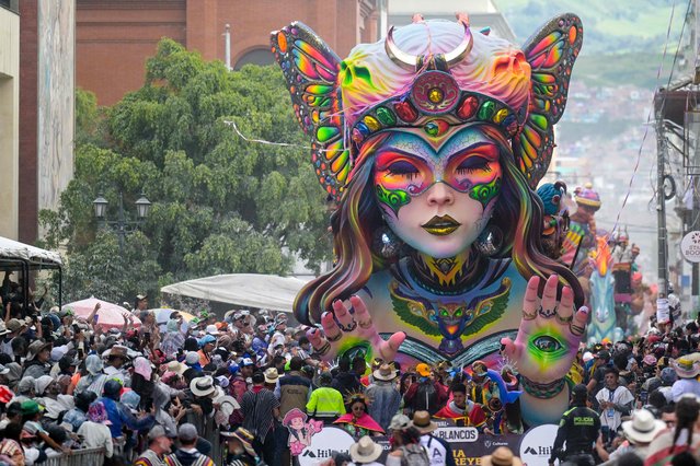 A float is seen during the “White Day” parade during the Carnival of Blacks and Whites in Pasto, Colombia on January 6, 2024. The Blacks and Whites carnival has its origins in a mix of Andean, Amazonian and Pacific cultural expressions, and it celebrates the ethnic diversity in the region and was proclaimed by UNESCO as intangible cultural heritage in 2009. (Photo by Joaquín Sarmiento/AFP Photo)