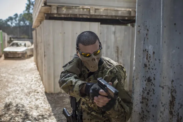 Israeli Airsoft teams in action during a combat simulation session, on October 7, 2014 in Kfar Saba, Israel. (Photo by Ilia Yefimovich/Getty Images)