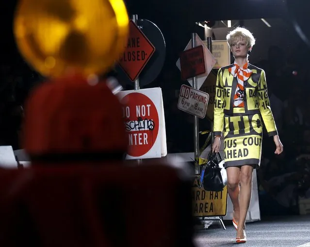 A model presents a creation from the Moschino Spring/Summer 2016 collection during Milan Fashion Week in Italy, September 24, 2015. (Photo by Alessandro Garofalo/Reuters)