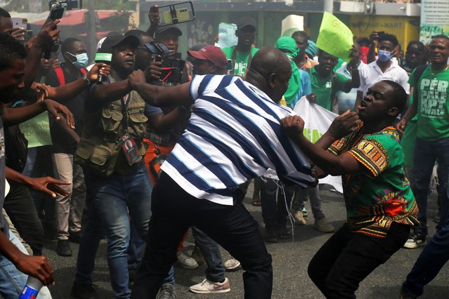 An activist opposing the protest movements is attacked by demonstrators during a protest against gang-related violence and the demand for the resignation of Haiti's transitional presidential council in Port-au-Prince, Haiti, on March 26, 2025. (Photo by Jean Feguens Regala/Reuters)