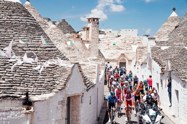 The peloton rolls out of town as cyclists compete in the Stage 4 Giro d’Italia race in Alberobello, Italy on May 13, 2025. (Photo by Zac Williams/SWpix.com/Rex Features/Shutterstock)
