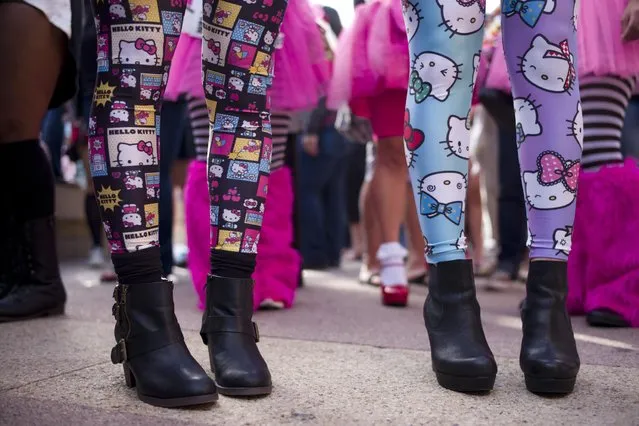 Hello Kitty fans wait in line for the Hello Kitty Con, the first ever Hello Kitty fan convention, held at the Geffen Contemporary at MOCA Thursday, October 30, 2014, in Los Angeles. (Photo by Jae C. Hong/AP Photo)