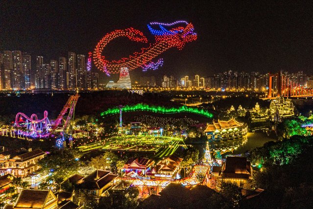 A super dragon pattern is being created by 2,000 drones in the night sky in Nanning, Guangxi Province, China, on February 12, 2024. (Photo by Costfoto/NurPhoto/Rex Features/Shutterstock)