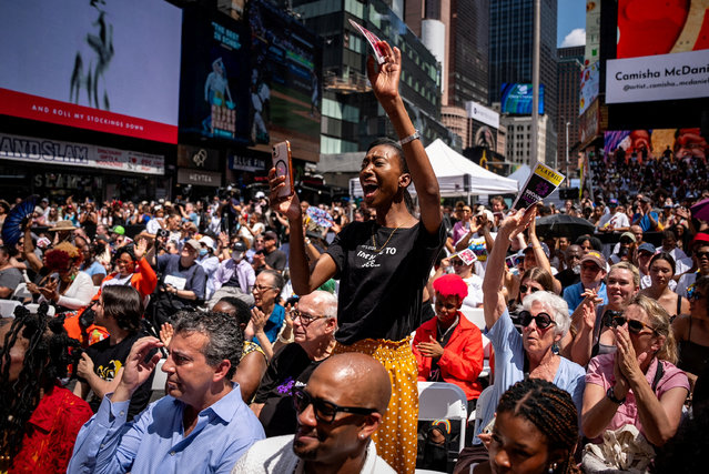 People cheer during the Broadway Celebrates Juneteenth concert at Times Square in New York City on June 19, 2025. (Photo by Angelina Katsanis/Reuters)