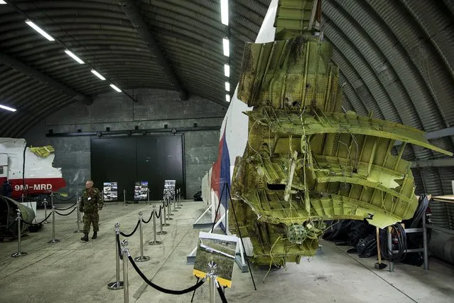 The wreckage of the MH17 airplane is seen after the presentation of the final report into the crash of July 2014 of Malaysia Airlines flight MH17 over Ukraine, in Gilze Rijen, the Netherlands, October 13, 2015. (Photo by Michael Kooren/Reuters)