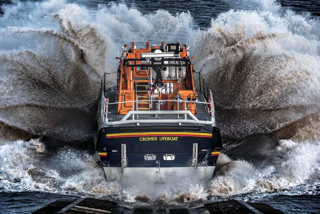 To the Rescue, showing the launch of Cromer lifeboat, by Stephen Duncombe. Winner in the Industry category. (Photo by Stephen Duncombe/Sea View Photography Competition 2020)