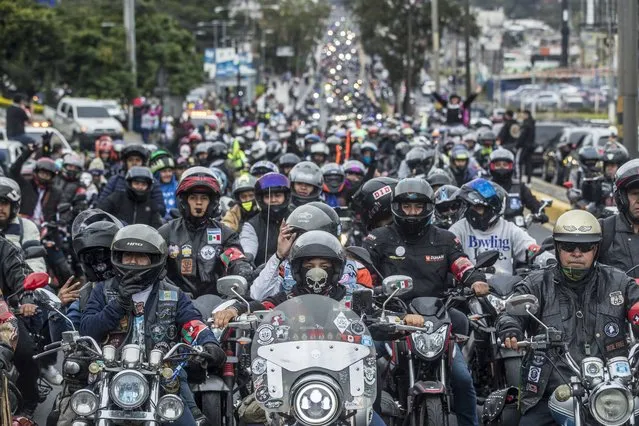 Motorcyclists participate in the so-called “Caravana del Zorro” (Fox Caravan) in Guatemala City, Guatemala, 04 February 2023. The Caravana del Zorro, one of the largest two-wheeled pilgrimages in the world, gathered 30,000 motorcycle riders in Guatemala City to undertake a 240-kilometer journey to the town of Esquipulas, as the event returned after a hiatus due to the coronavirus disease (COVID-19) pandemic. (Photo by Esteban Biba/EPA)