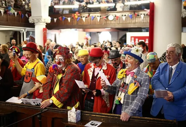 Clowns and entertainers attend the annual service of remembrance in honour of British clown Joseph Grimaldi, at the All Saints Church in Haggerston, London, Britain on February 5, 2023. (Photo by Henry Nicholls/Reuters)