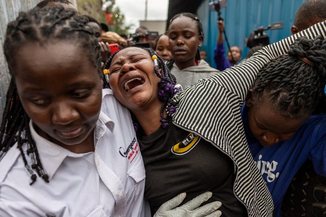 A family member reacts near the scene where a Kenyan medical plane crashed, killing at least 6 people, on the outskirts of Nairobi on August 7, 2025. A medical light aircraft crashed into a small residential block near the Kenyan capital Nairobi, killing at least six people and injuring two seriously, a local official said on August 7, 2025. (Photo by Simon Maina/AFP Photo)