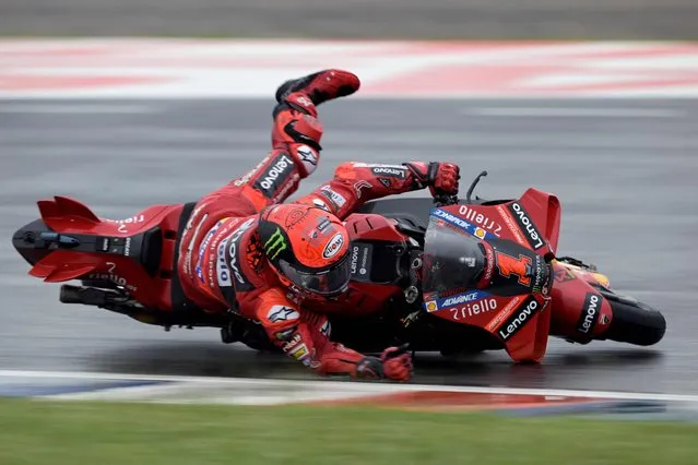 Ducati Italian rider Francesco Bagnaia falls during the Argentina Grand Prix MotoGP race, at Termas de Rio Hondo circuit, in Santiago del Estero, Argentina, on April 2, 2023. (Photo by Juan Mabromata/AFP Photo)