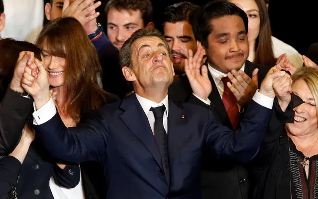 Nicolas Sarkozy (C), former head of the “Les Republicains” political party, waves at the end of his political rally in Marseille, France, as he campaigns for the French center-right presidential primary, October 27, 2016. (Photo by Jean-Paul Pelissier/Reuters)