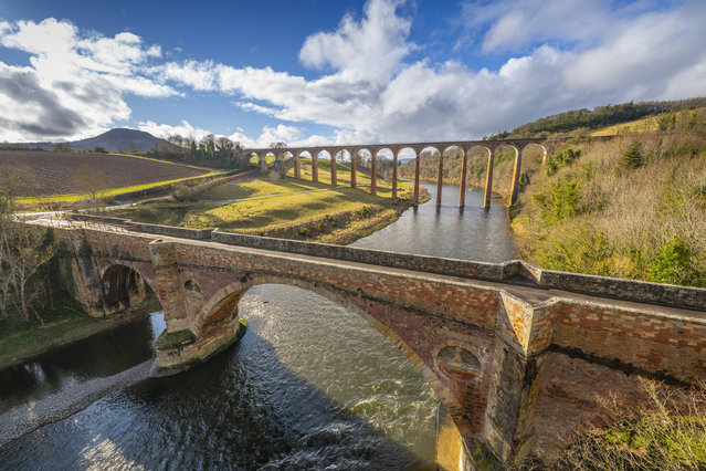 A lovely view over the River Tweed as the old Tweed Bridge and arched Leaderfoot Viaduct, UK shine in the afternoon spring sunshine on February 26, 2025. The view is a popular spot for visitors to the Scottish Borders, near Melrose. (Photo by Phil Wilkinson/The Times)