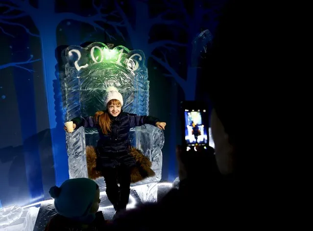 A girl poses with ice sculptures in an ice room at a mall in Minsk, Belarus, December 7, 2015. (Photo by Vasily Fedosenko/Reuters)