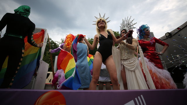 Participants perform during a gay pride march in central Kiev on June 17, 2018. (Photo by Serhii Nuzhnenko/Radio Free Europe/Radio Liberty)