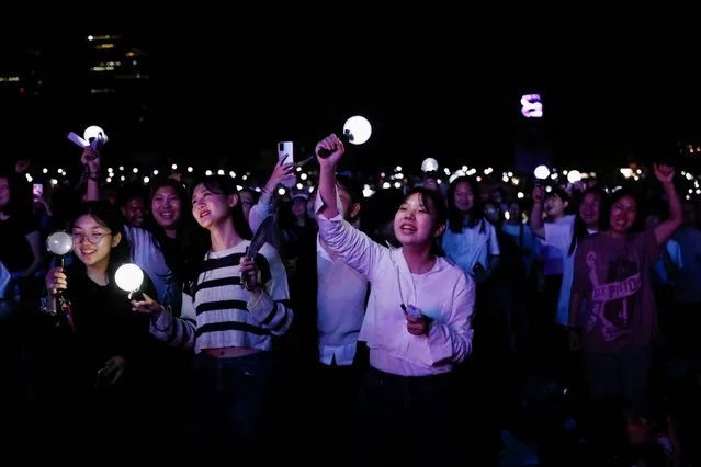 Fans of the K-pop boy band BTS dance during BTS 10th Anniversary FESTA in Seoul, South Korea on June 17, 2023. (Photo by Kim Soo-hyeon/Reuters)