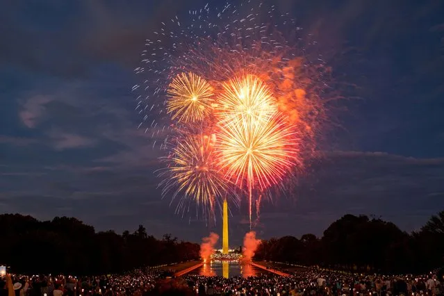 Fireworks explode over the National Mall during Fourth of July celebrations, in Washington, U.S., July 4, 2023. (Photo by Kevin Wurm/Reuters)