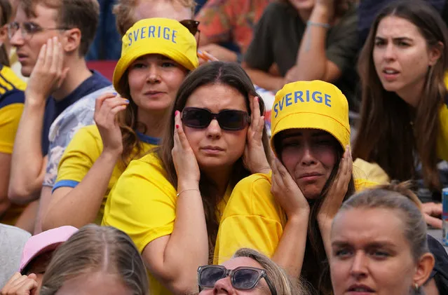 Fans in Stockholm react as they watch the semifinal match between Spain vs. Sweden during the FIFA Women's World Cup Australia and New Zealand on August 15, 2023. (Photo by Janis Laizans/Reuters)