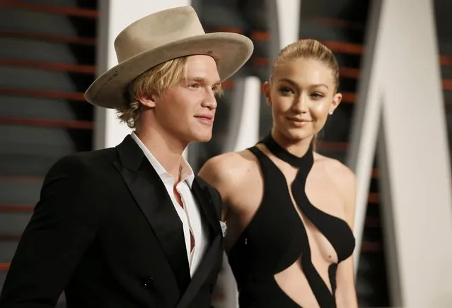 Singer Cody Simpson and model Gigi Hadid arrive at the 2015 Vanity Fair Oscar Party in Beverly Hills, California February 22, 2015. (Photo by Danny Moloshok/Reuters)