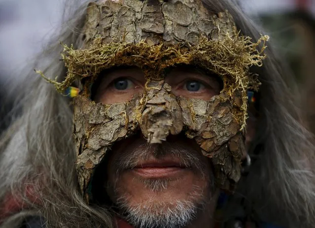 An environmental activist wears a mask made from tree bark as he takes part in march in defence of Europe's last ancient forest, the Bialowieza Primeval Forest, in Warsaw, Poland January 17, 2016. (Photo by Kacper Pempel/Reuters)