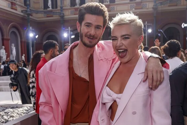 English and American actor Andrew Garfield, left, and English actress Florence Pugh attend the Valentino Spring/Summer 2024 womenswear fashion collection presented Sunday, October 1, 2023 in Paris. (Photo by Vianney Le Caer/AP Photo)