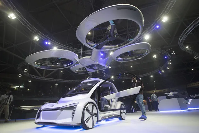 Pop.Up Next, a prototype designed by Audi, Airbus and Italdesign is displayed at the Amsterdam Drone Week in Amsterdam, Netherlands, Tuesday, November 27, 2018. The two-seater vehicle combines combines ground transportation with vertical take-off and landing capabilities. (Photo by Peter Dejong/AP Photo)