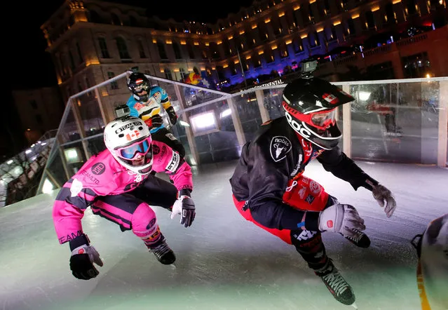 Competitors take part in the Red Bull Crashed Ice Cross Downhill World Championship in Marseille , January 14, 2017. (Photo by Jean-Paul Pelissier/Reuters)