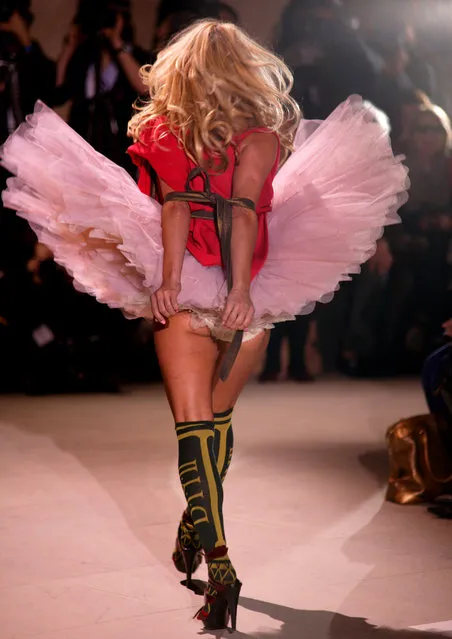 Canadian-American actress and model Pamela Anderson walks the runway at the Vivienne Westwood Ready-to-Wear A/W 2009 fashion show during Paris Fashion Week at Couvent des Cordeliers on March 6, 2009 in Paris, France. (Photo by Antonio de Moraes Barros Filho/WireImage)