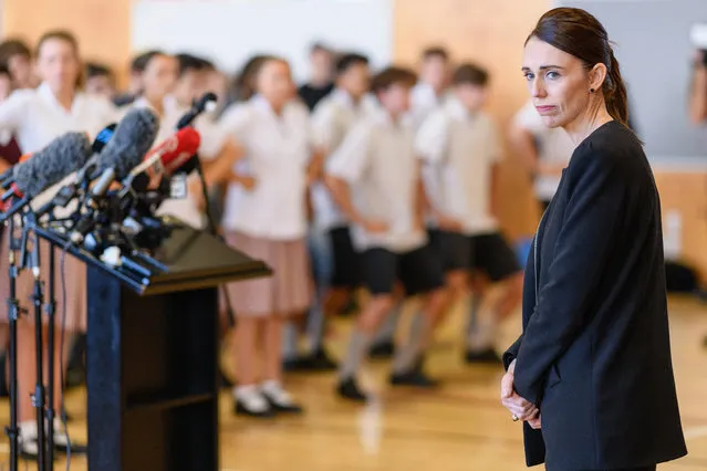 New Zealand Prime Minister Jacinda Ardern reacts as students perfom a Haka during her visit to Cashmere High School which lost two students during a mass shooting on March 20, 2019 in Christchurch, New Zealand. 50 people were killed, and dozens are still injured in hospital after a gunman opened fire on two Christchurch mosques on Friday, 15 March. The accused attacker, 28-year-old Australian, Brenton Tarrant, has been charged with murder and remanded in custody until April 5. The attack is the worst mass shooting in New Zealand's history. (Photo by Kai Schwoerer/Getty Images)