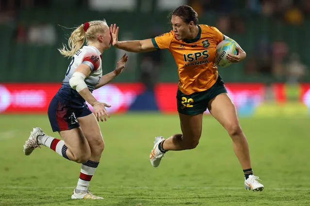 Bienne Terita of Australia fends of Heather Cowell of Great Britain during the 2024 Perth SVNS women's match between Australia and Great Britain at HBF Park on January 26, 2024 in Perth, Australia. (Photo by Paul Kane/Getty Images)
