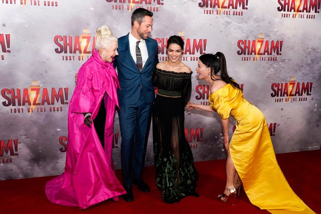 Actors Helen Mirren, Zachary Levi, Rachel Zegler and Lucy Liu pose for photographers upon arrival at the premiere of the film “Shazam! Fury of the Gods” in London, Tuesday, March 7, 2023.(Photo by Alberto Pezzali/Invision/AP Photo)