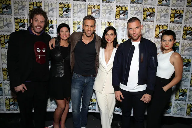 T.J. Miller, Gina Carano, Ryan Reynolds, Morena Baccarin, Ed Skrein and Brianna Hildebrand seen at the Twentieth Century Fox Presentation at 2015 Comic Con on Saturday, July 11, 2015, in San Diego. (Photo by Eric Charbonneau/Invision for Twentieth Century Fox/AP Images)
