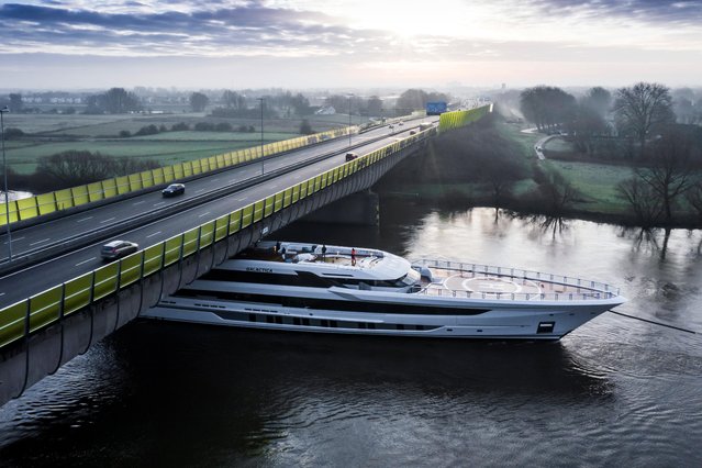 The Dutch shipbuilder Heesen moves the 80m motor yacht Galactica from its shed in Oss, Netherlands to the North Sea on January 17, 2022. The shipbuilders, Heesen, had to wait for the perfect weather and tide conditions to be able to complete the voyage. (Photo by Heesen/South West News Service)